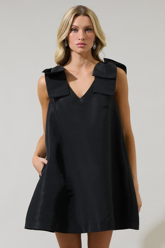 Alani Bow Trapeze Mini Dress IZEL BOUTIQUE Alani Bow Trapeze Mini Dress IZEL BOUTIQUE